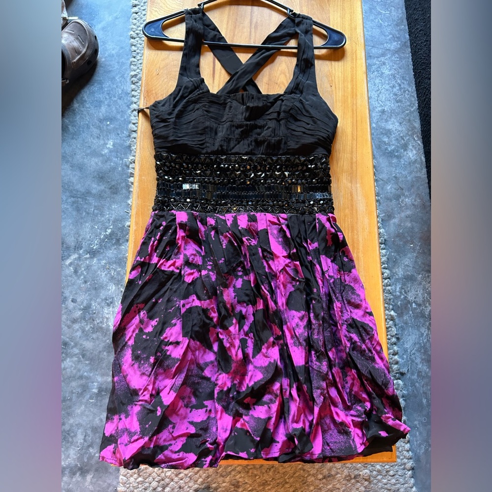 Bebe dress, never worn. Size XS. Beautiful details.